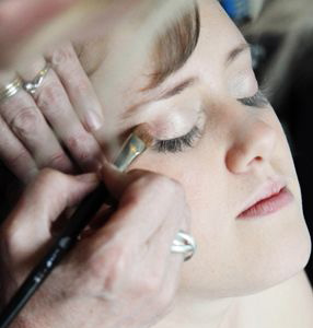 Bride having a natural wedding makeup applied -  Karen Loraine